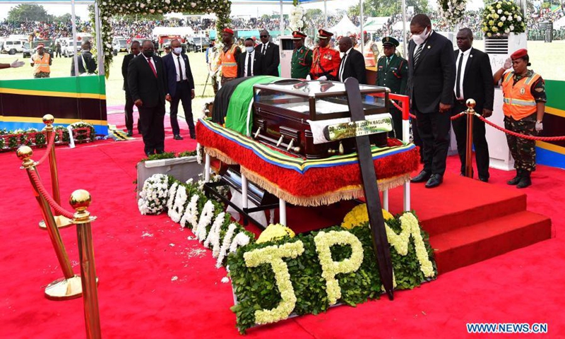 Mozambican President Filipe Nyusi (3rd R) pays his respect to former Tanzanian President John Magufuli in Dodoma, capital of Tanzania, on March 22, 2021. Tanzania held a state funeral for John Magufuli at the Jamhuri Stadium in Dodoma on Monday, with the attendance of African leaders, representatives and other dignitaries. Magufuli, 61, died in office from a heart condition on March 17 in the country's commercial capital Dar es Salaam.(Photo: Xinhua)