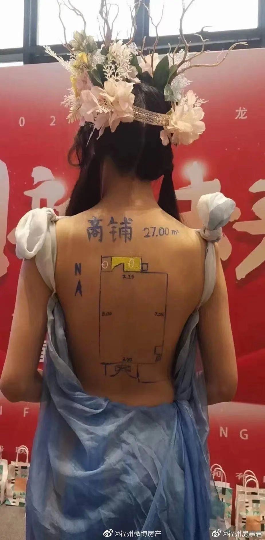 A real estate agency in Xi'an, Northwest China's Shaanxi Province, has sparked heated debate among Chinese netizens after displaying house plans on the backs of female models at a promotional event. Photo: Sina Weibo