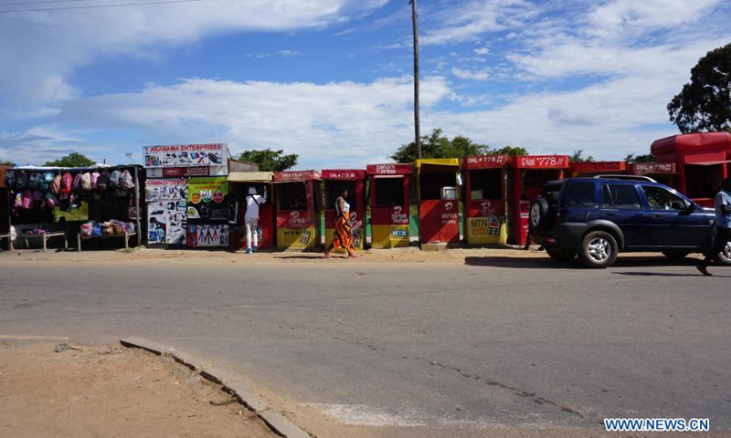 Mobile money booths are seen in Lusaka, Zambia, on March 17, 2021. The mobile phone communication services industry has over the years provided a host of employment opportunities across Africa through its range of services. Among the opportunities created by the industry are mobile money services, which involve the electronic receipt, transfer, and storage of money using a cellular phone.(Photo: Xinhua)