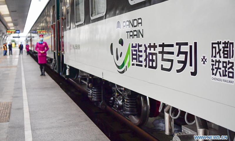 The panda train is seen in Chengdu, southwest China's Sichuan Province, March 24, 2021. China's first panda-themed tourist train panda train started trial run in Sichuan on Wednesday and will start operation on March 28. Transformed from a normal train, the panda train features upgraded standards inclucing 5G wireless network coverage, music and video entertainment system, restaurant and bar, chess and card room and private toilets with constant temperature shower in sleeping carriages. (Photo: Xinhua)