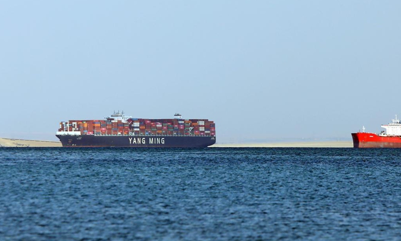 Ships wait to pass the Suez Canal on the Great Bitter Lake, in the province of Ismailia, Egypt, March 25, 2021. Egypt's Suez Canal Authority (SCA) said on Thursday that it has temporarily suspended navigation through the world's busiest shipping course until the grounded cargo ship is completely freed.Photo:Xinhua