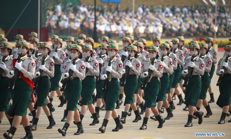 Soldiers march in a formation during a parade to mark the 76th Armed Forces Day in Nay Pyi Taw, Myanmar, March 27, 2021. (Photo: Xinhua)