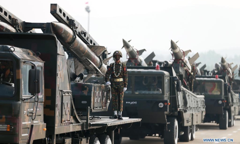 Military vehicles march in a formation during a parade to mark the 76th Armed Forces Day in Nay Pyi Taw, Myanmar, March 27, 2021.(Photo: Xinhua)