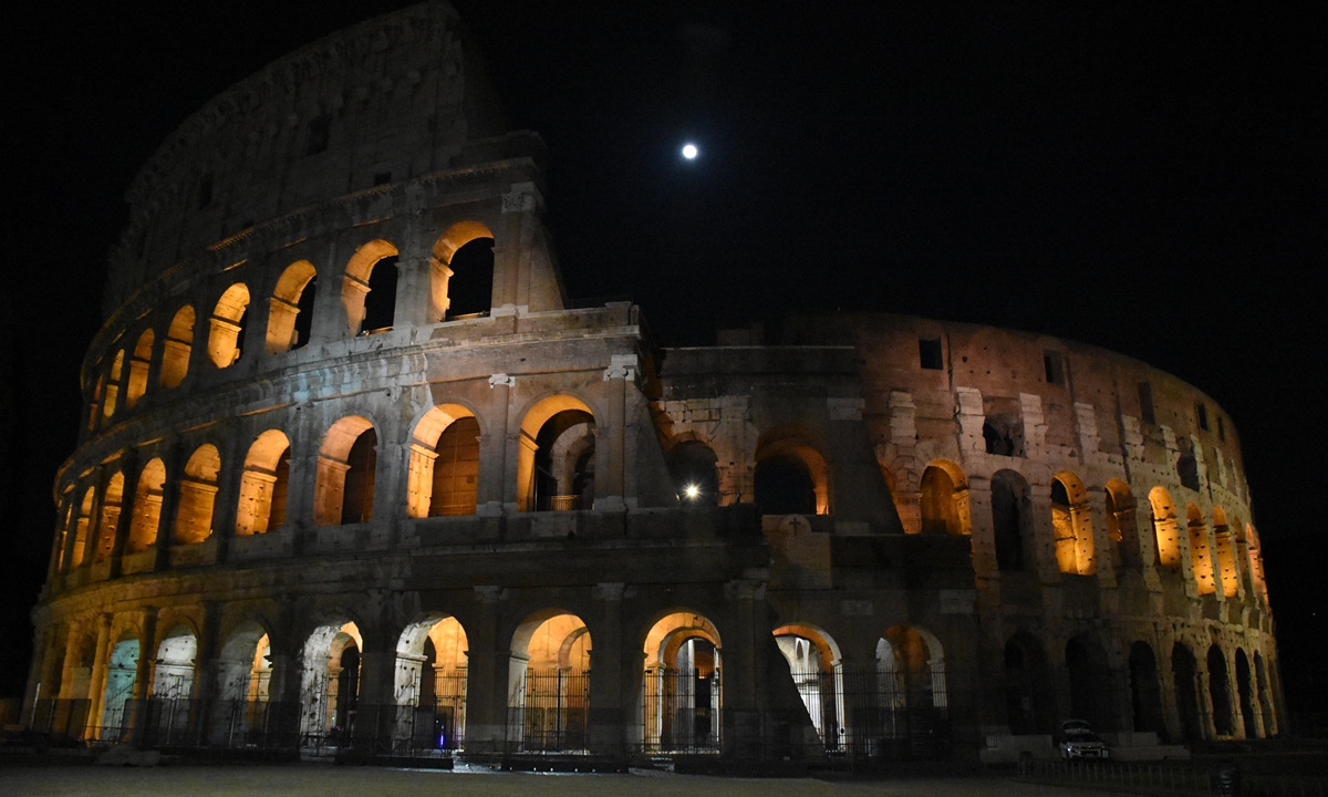  a view of iconic Rome Colosseum in Rome, Italy on March 27, 2021. An annual lights-off environmental event organised by the WWF [World Wide Fund for Nature] to raise awareness of climate change. As part of the event, the lights at the Colosseum were switched off on Saturday. Photo: VCG