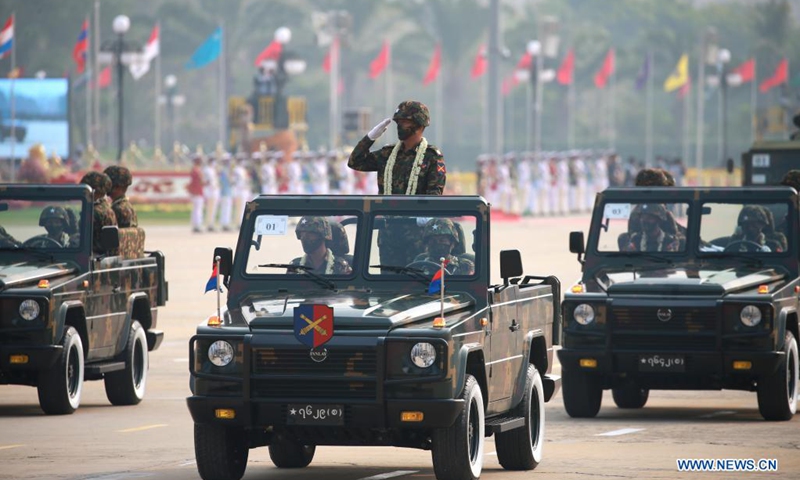 Military vehicles march in a formation during a parade to mark the 76th Armed Forces Day in Nay Pyi Taw, Myanmar, March 27, 2021.(Photo: Xinhua)