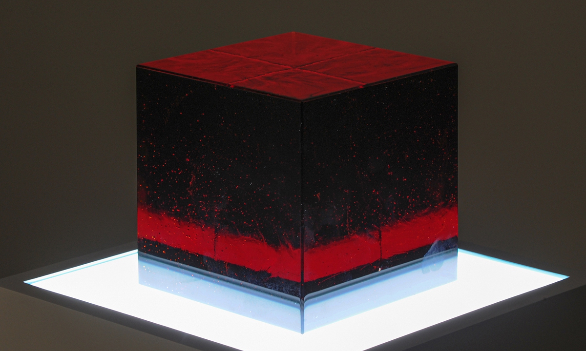 13-centimeter cubed burgundy red crystal sculpture shows the total amount of blood in the artist. Photo: Courtesy for No.1 Jade River gallery