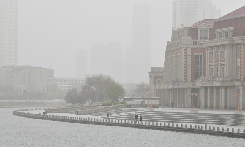 Buildings are shrouded by sand storm in Tianjin, north China, March 28, 2021. (Xinhua)