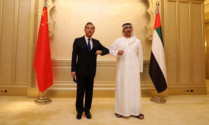 Visiting Chinese State Councilor and Foreign Minister Wang Yi (L) meets with his counterpart of the United Arab Emirates Sheikh Abdullah bin Zayed al-Nahyan in Abu Dhabi, the United Arab Emirates, on March 28, 2021.(Photo: Xinhua)