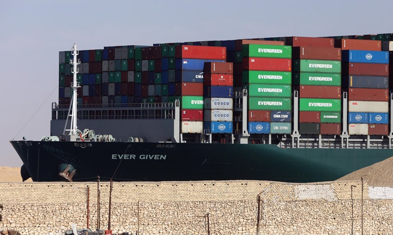 Photo taken on March 29, 2021 shows the container ship Ever Given moving on the Suez Canal, Egypt.(Photo: Xinhua)