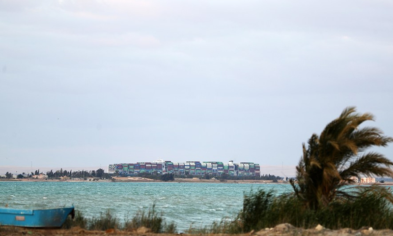 Photo taken on March 29, 2021 shows the container ship Ever Given moving on the Suez Canal, Egypt.(Photo: Xinhua)