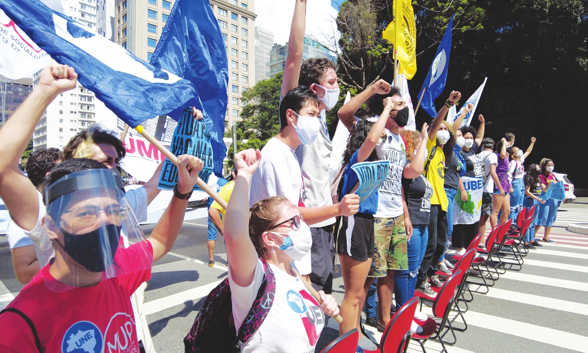 Demonstrators take part in a protest against Brazil's President Jair Bolsonaro in Sao Paulo, Brazil, on Tuesday. Photo: VCG