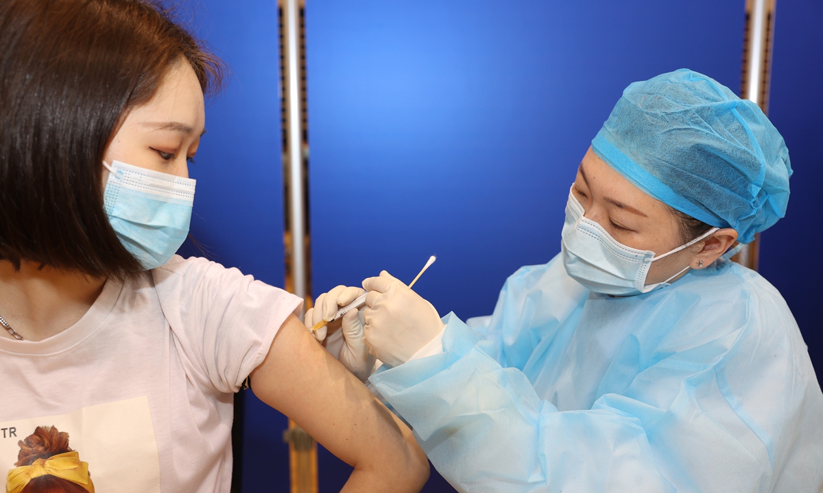 A student is vaccinated at a stadium in Wuxi, East China's Jiangsu Province on Tuesday. Photo: cnsphoto