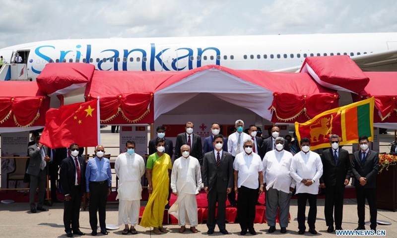 Sri Lankan President Gotabaya Rajapaksa (5th R, front ) attends the handover ceremony of Sinopharm COVID-19 vaccines at the Bandaranaike International Airport in Colombo, Sri Lanka, March 31, 2021. A batch of Sinopharm vaccines arrived in Sri Lanka from China on Wednesday as part of a donation by the Chinese government to the island nation.Photo:Xinhua