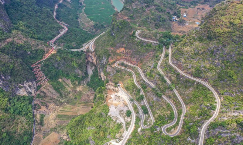 Aerial photo taken on April 16, 2020 shows the Nongfu Road in Lingyun County, south China's Guangxi Zhuang Autonomous Region. Since 2016, Guangxi has promoted the construction and improvement of rural road network, with 52,900-kilometer roads built to link villages in rural areas.Photo:Xinhua