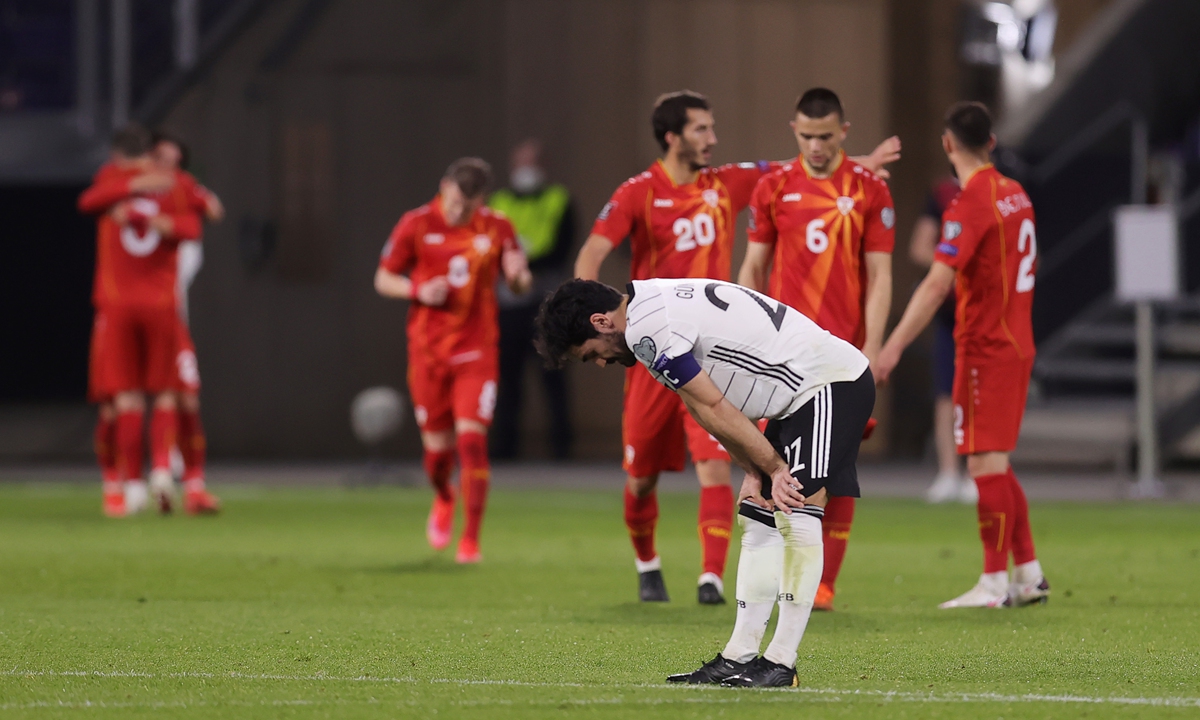 Ilkay Gundogan of Germany looks dejected during the World Cup qualifying match against North Macedonia on Wednesday in Duisburg, Germany.  Photo: VCG