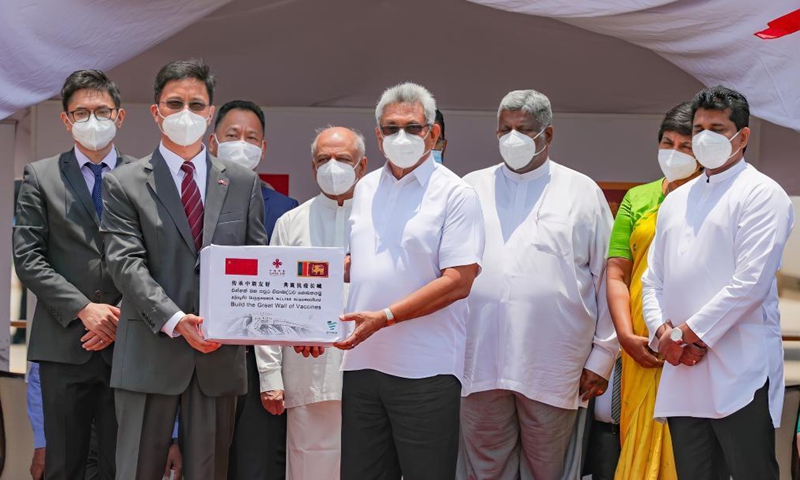 Sri Lankan President Gotabaya Rajapaksa (4th R, front ) attends the handover ceremony of Sinopharm COVID-19 vaccines at the Bandaranaike International Airport in Colombo, Sri Lanka, March 31, 2021. A batch of Sinopharm vaccines arrived in Sri Lanka from China on Wednesday as part of a donation by the Chinese government to the island nation.Photo:Xinhua