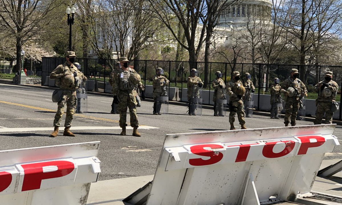 US National Guard members stand guard in front of the U.S. Capitol building in Washington, D.C., the United States, on April 2, 2021. (Xinhua/Liu Jie)