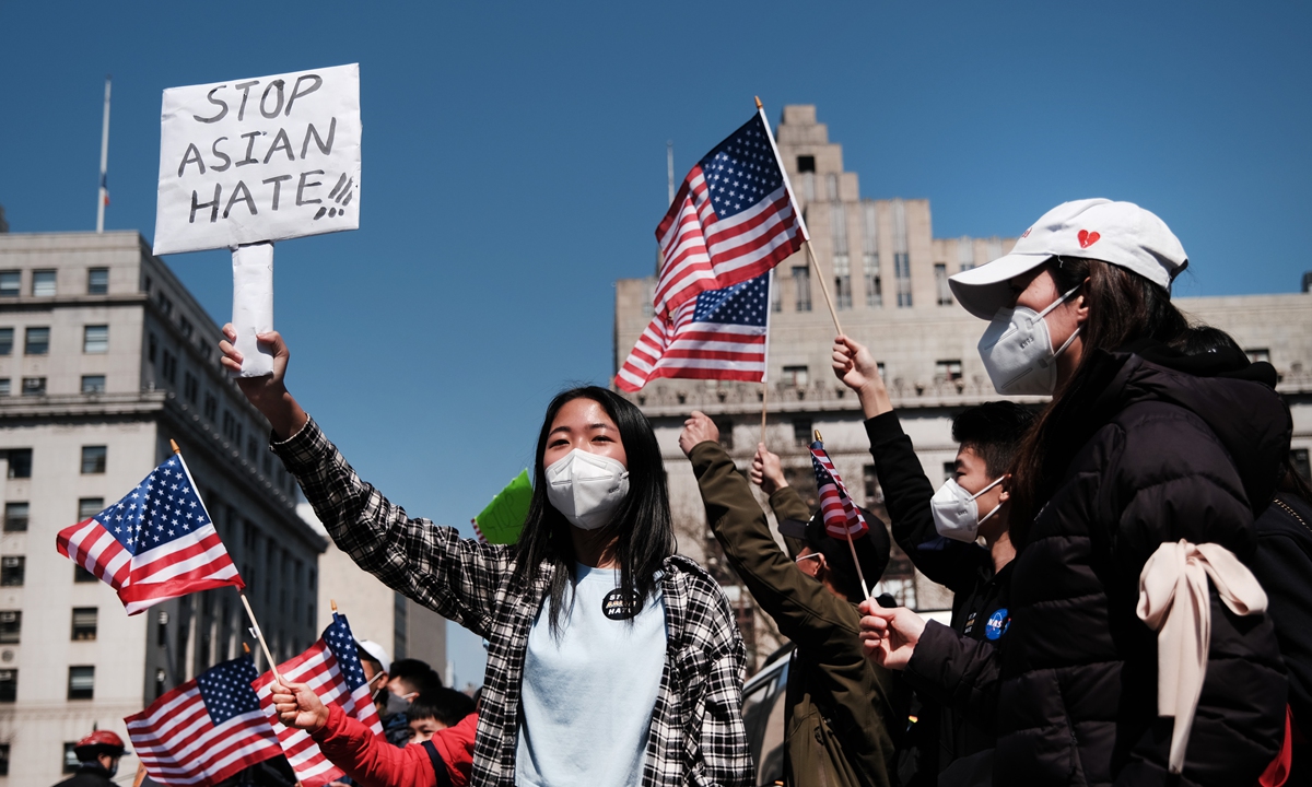 People participate in a protest to demand an end to anti-Asian violence on Sunday in New York City. The group, which numbered near 3000 and was made up of activists, residents and local politicians, marched across the Brooklyn Bridge. After a rise in hate crimes against Asians across the US and in New York City, groups are speaking up and demanding more attention to the issue. Photo: VCG