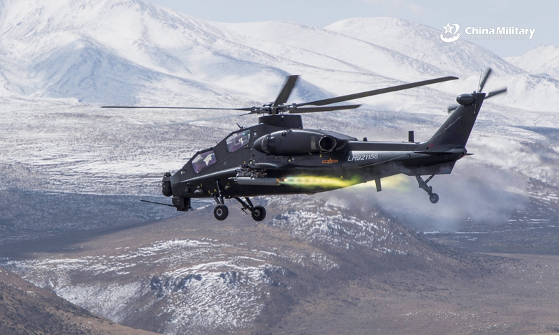 An armed helicopter assigned to an army aviation brigade under the PLA Tibet Military Command carries out live-fire training on March 25, 2021, aiming to improve the air combat capability. (eng.chinamil.com.cn/Photo by Li Guotao)