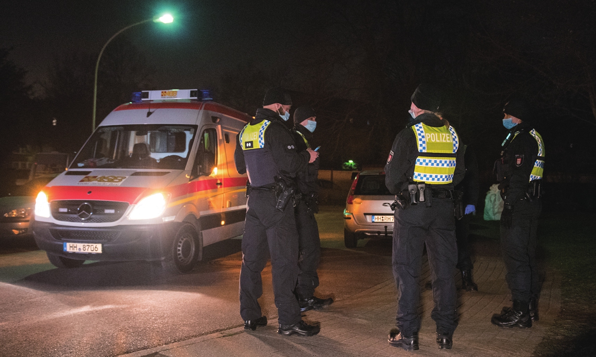 Police officers prepare the evacuation for a bomb defusing operation in the district of Wilhelmsburg in Hamburg, Germany on Monday. A walker had found the 114-kilogram World War II bomb on a construction site, and it was successfully defused. Photo: AFP