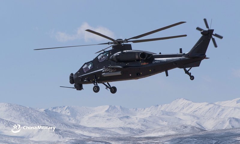 An armed helicopter assigned to an army aviation brigade under the PLA Tibet Military Command carries out live-fire training on March 25, 2021, aiming to improve the air combat capability. (eng.chinamil.com.cn/Photo by Li Guotao) 