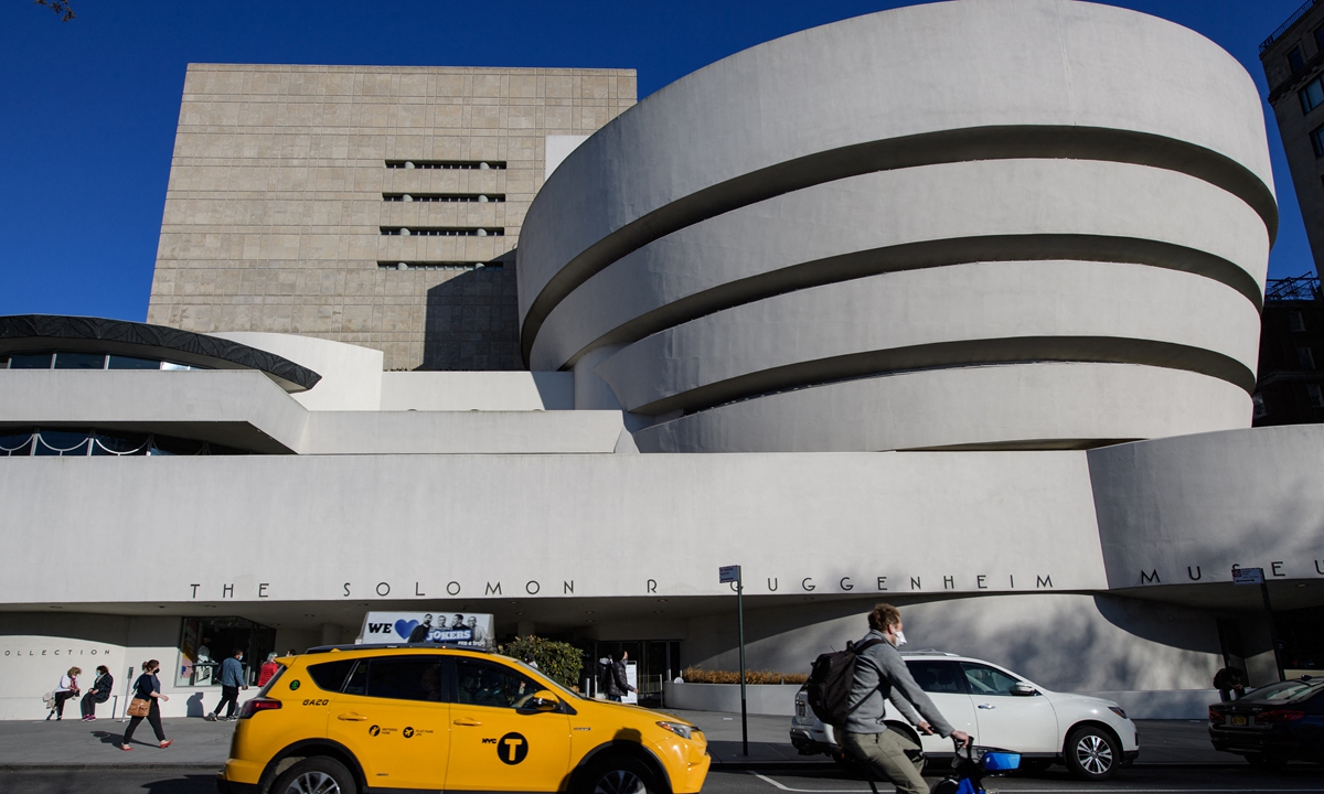 People walk past the Solomon R. Guggenheim Museum in New York. Photo: AFP
