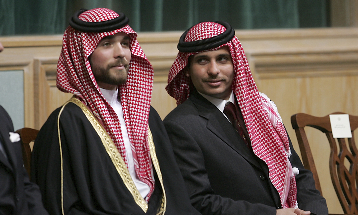 Prince Hamza Bin Al-Hussein (right) and Prince Hashem Bin Al-Hussein, brothers King Abdullah II of Jordan, attend the opening of the parliament in Amman, Jordan, on November 28, 2006. Photo: VCG