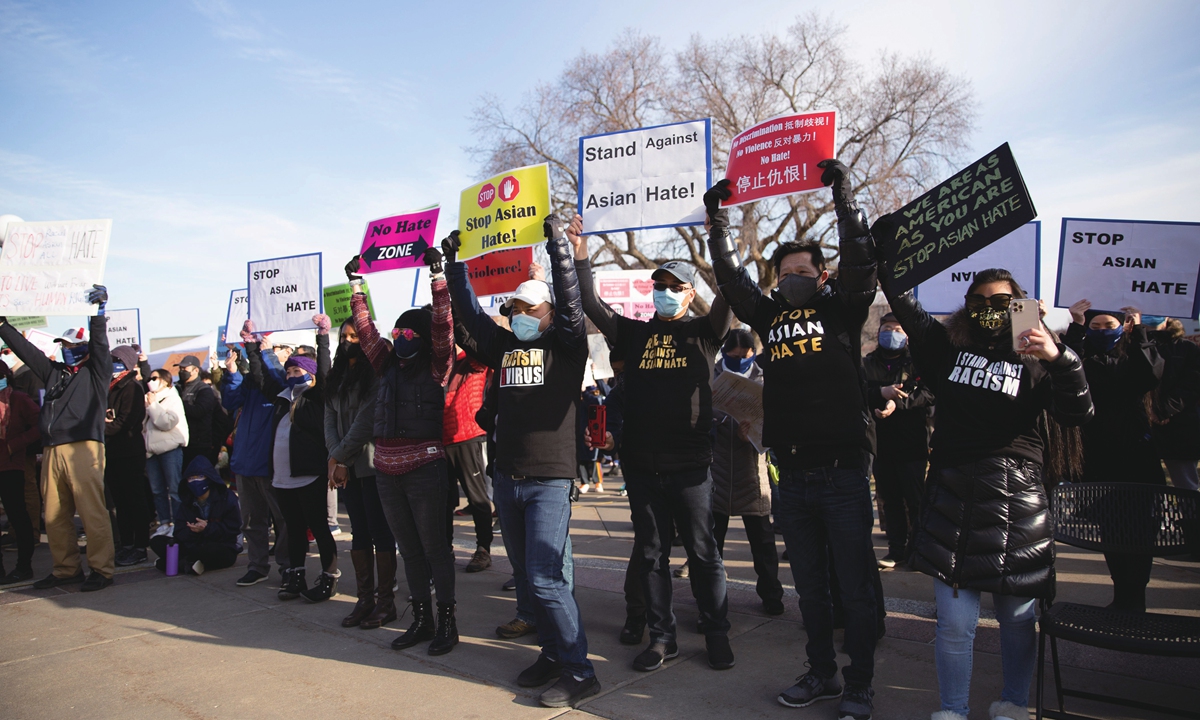 About 300 demonstrators gather on the steps of the Minnesota State Capitol to protest a spike in anti-Asian bias in Saint Paul, Minnesota, the US on March 28. Photo: VCG
