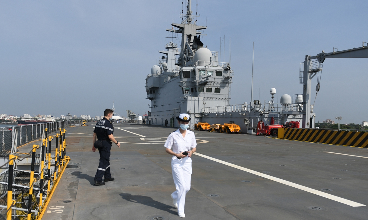 Cadets seen on the deck of the French amphibious assault helicopter carrier Tonnerre, as they prepare to dock at Cochin Port, in Kochi on March 30, 2021. Photo: AFP