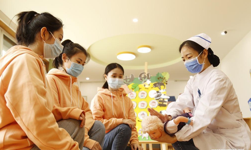Teachers learn emergency rescue techniques from a medical worker at a kindergarten on the occasion of World Health Day in Xingtai City, north China's Hebei Province, April 7, 2021. (Photo:Xinhua)