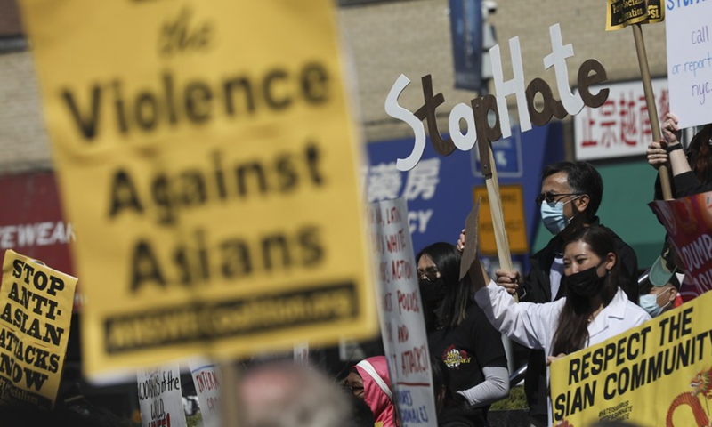 People attend a rally against racism and violence on Asian Americans in Flushing of New York, the United States, March 27, 2021.(Photo: Xinhua)