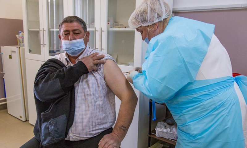 A man receives the COVID-19 vaccine in Majdanpek, Serbia, on April 6, 2021. Serbia, a country of around 7 million inhabitants, is the first European country to start mass vaccination with Sinopharm vaccines in mid-January.(Photo: Xinhua)