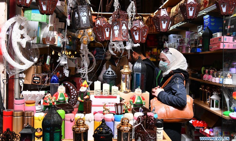 People visit a market ahead of the Islamic holy month of Ramadan in Damascus, Syria, on April 7, 2021.(Photo: Xinhua)
