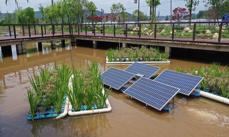 A photovoltaic power generation system provides electricity for the operation of water aeration equipment in Taihe county, East China's Jiangxi Province on Sunday. Photovoltaic power generation has helped improve the water system's ecology with clean and sustainable energy. An abandoned river channel was converted into a photovoltaic power station in Taihe in 2019. Photo: VCG