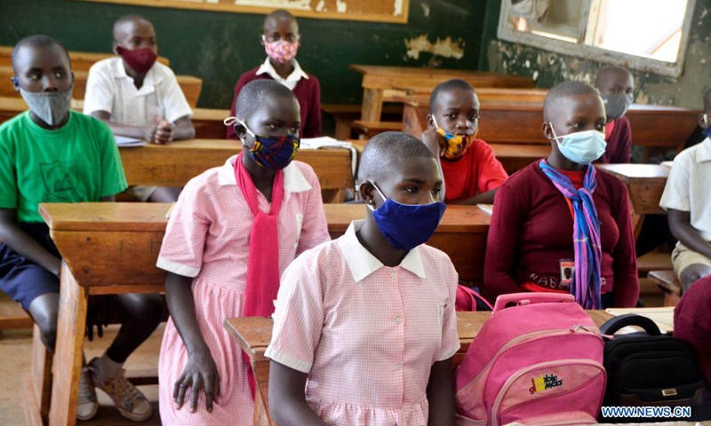 Pupils of a primary school attend a class in Kampala, Uganda, April 6, 2021. Uganda reopened classes on Tuesday for students in their fourth and fifth grades at primary schools. In March of 2020, the country closed all schools and education institutions to curb the spread of COVID-19.(Photo: Xinhua)