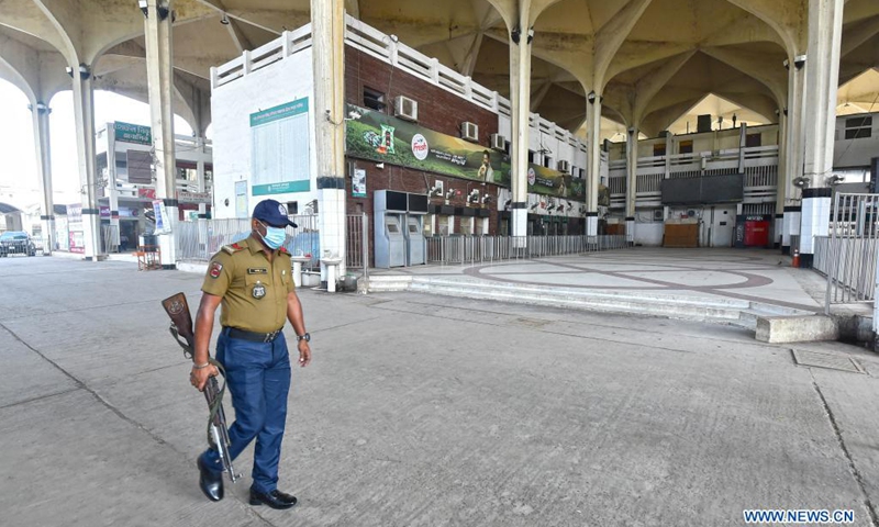 A security guard is seen at an empty train station during a nationwide lockdown amid a recent surge in COVID-19 cases in Dhaka, Bangladesh, April 7, 2021. Bangladesh's Directorate General of Health Services (DGHS) on Wednesday reported 7,626 new COVID-19 infections, the highest increase in a single day since the pandemic started in the country. To control the new COVID-19 wave in the country, the Bangladeshi government on Monday enforced a one-week lockdown.(Photo: Xinhua)