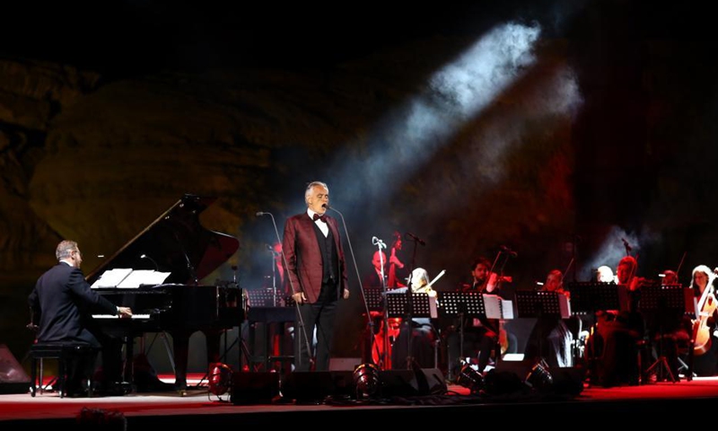 Italian tenor Andrea Bocelli performs at a concert in Al-Ula, northwestern Saudi Arabia, April 8, 2021. The Italian legendary tenor Andrea Bocelli on Thursday evening performed within the walls of Hegra, Saudi Arabia's first UNESCO World Heritage Site.  Photo: Xinhua