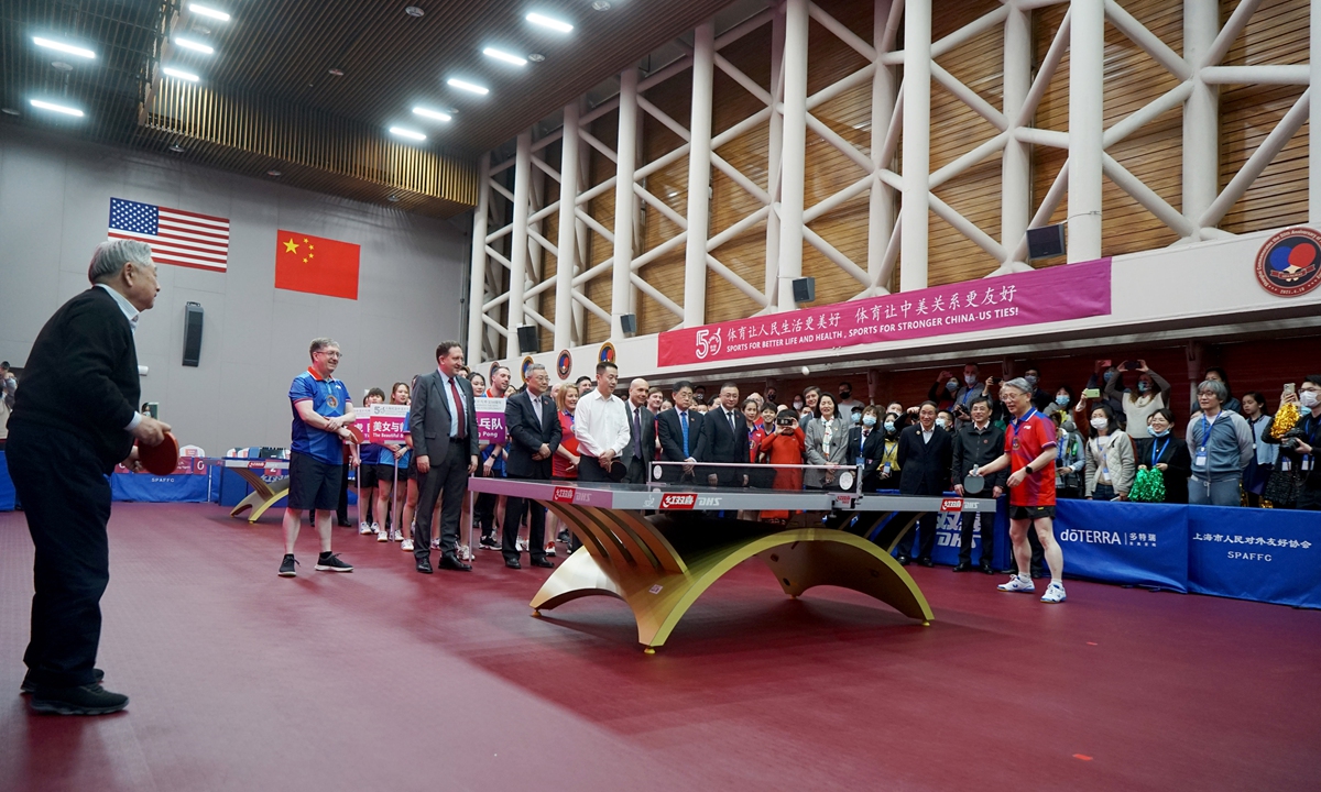 Xu Yinsheng (left), honorary president of the International Table Tennis Federation (ITTF), plays table tennis with Sha Hailin, chairman of the Shanghai People's Association for Friendship with Foreign Countries, at the Champion Hall of the International Table Tennis Federation Museum and China Table Tennis Museum in Shanghai on Saturday, where the commemorative event took place. Photo: Chen Xia/GT