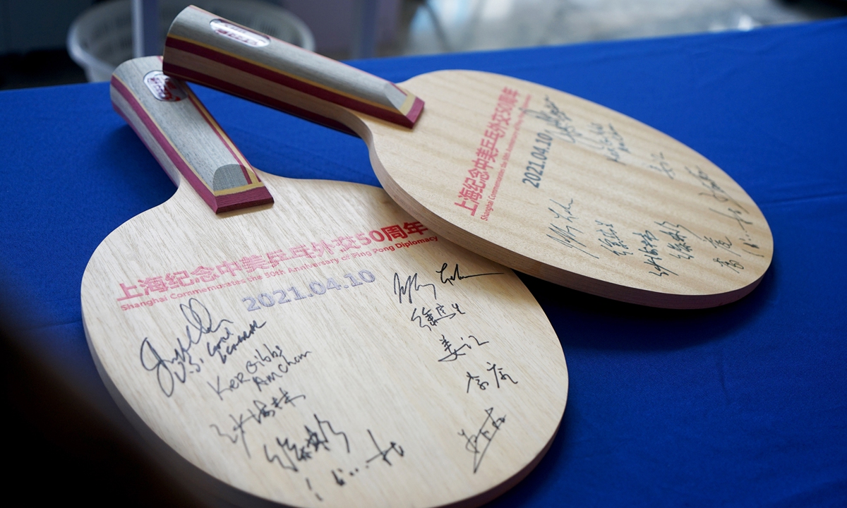 A pair of table tennis rackets with signatures of some participants of their commemoration, including former table tennis gold medalists and enthusiasts from both China and the US. Photo: Chen Xia/GT