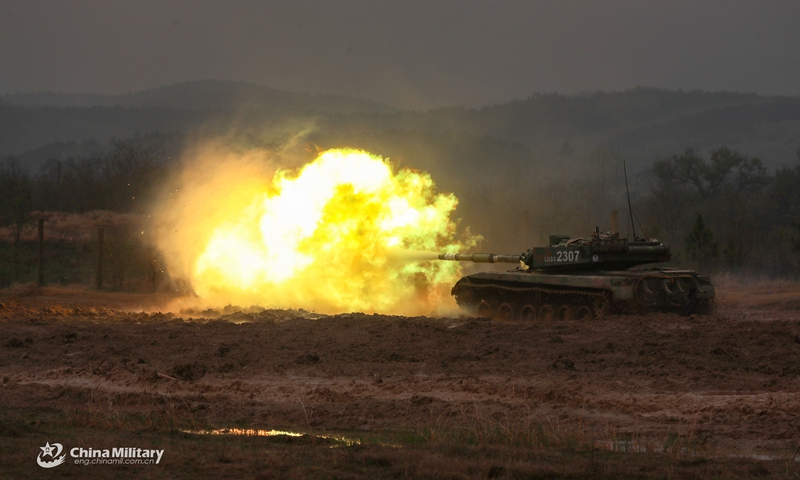 A tank attached to a combined arms brigade under the PLA 72nd Group Army attacks mock targets while advancing during a live-fire training exercise from March 26 to 29, 2021. (Photo: eng.chinamil.com.cn)