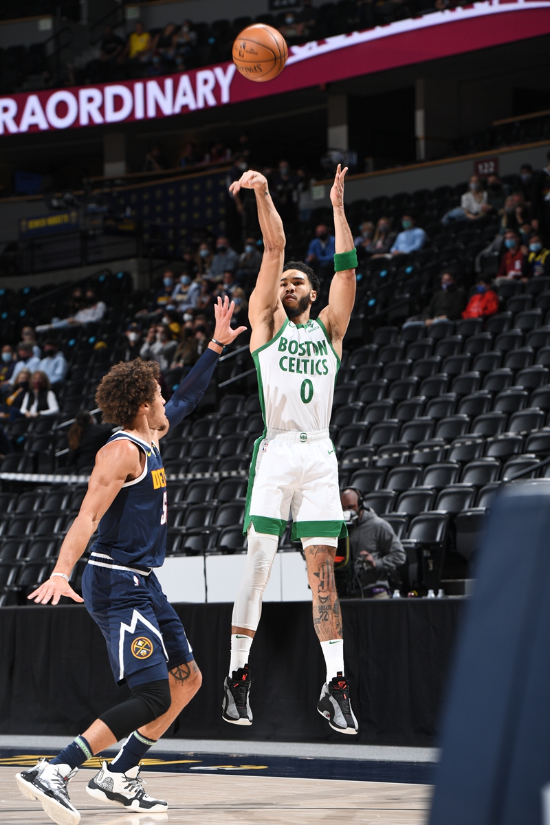 Jayson Tatum of the Boston Celtics shoots the ball against the Denver Nuggets on Sunday in Denver, Colorado. Photo: VCG