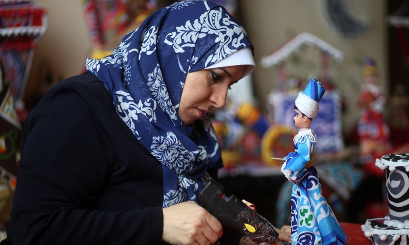 Hanan al-Madhoun makes figures and decorations ahead of Ramadan in Gaza City, April 11, 2021.(Photo: Xinhua)