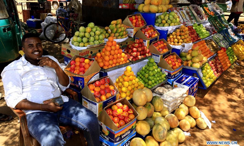 A fruit seller prepares to meet customers' needs for the upcoming holy month of Ramadan in Khartoum, Sudan, April 12, 2021. (Photo: Xinhua)