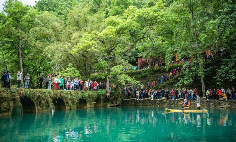 Tourists visit Xiaoqikong scenic spot in Libo County, southwest China's Guizhou Province, April 15, 2021.  Photo: Xinhua