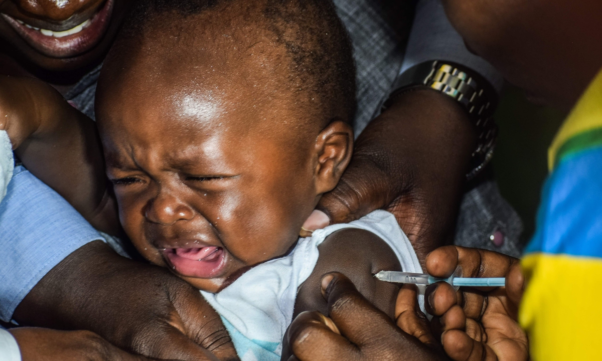 A child is vaccinated against malaria on September 13, 2019 in Ndhiwa, Homabaya County, Western Kenya during the launch of malaria vaccine in Kenya. Photo: VCG