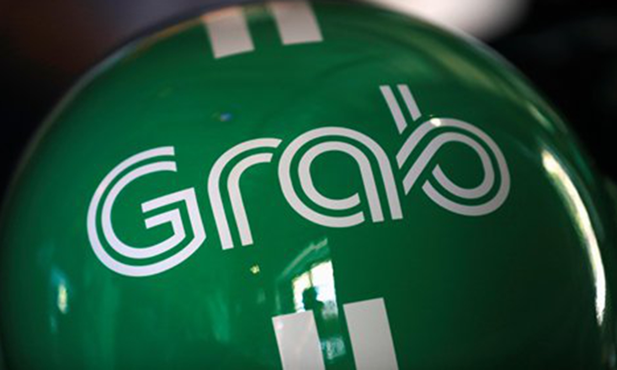 A Grab motorbike helmet is displayed during Grab's fifth anniversary news conference in Singapore June 6, 2017. Photo: CFP