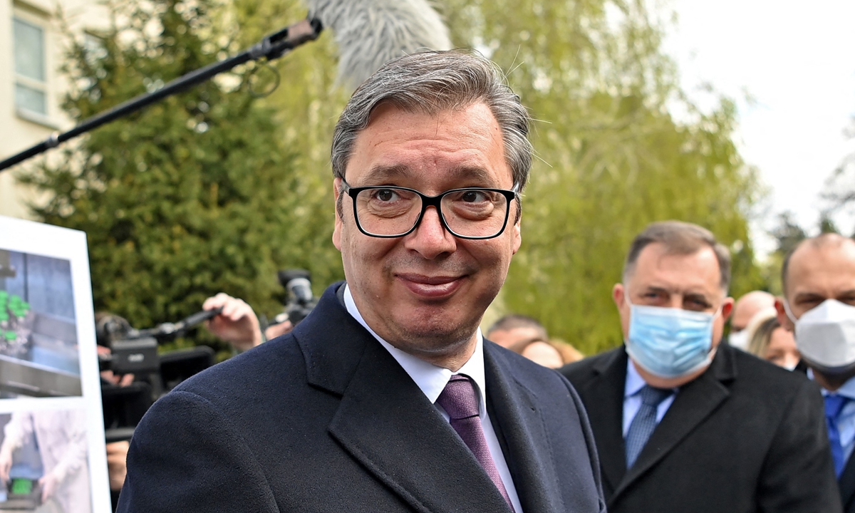 Serbian President Aleksandar Vucic holds a vial containing the Sputnik V coronavirus vaccine during his visit to Belgrade's Torlak Institute, where the vaccine has been manufactured, on Thursday. Moscow on Wednesday announced the start of production of its Sputnik V coronavirus vaccine in Serbia, the first European country outside Russia and Belarus to begin manufacturing the shot.  Photo: AFP