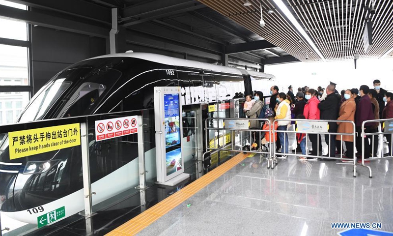 Passengers enter No.1 Subway Station to take SkyShuttle in Bishan District, southwest China's Chongqing Municipality, on April 16, 2021.  Photo: Xinhua