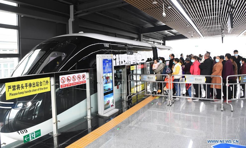 Passengers enter No.1 Subway Station to take SkyShuttle in Bishan District, southwest China's Chongqing Municipality, on April 16, 2021. Photo: Xinhua