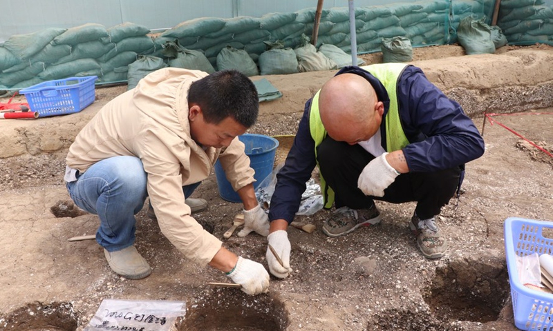 Archaeologists work at the Jinlan Temple site in Guangzhou, capital of south China's Guangdong Province on April 14, 2021.Photo:Xinhua